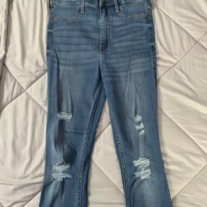 medium/dark wash hollister lightly ripped jeans